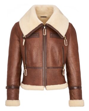 Kożuch damski w brązowym kolorze z kołnierzem z kożucha i dwoma kieszeniami na zamek